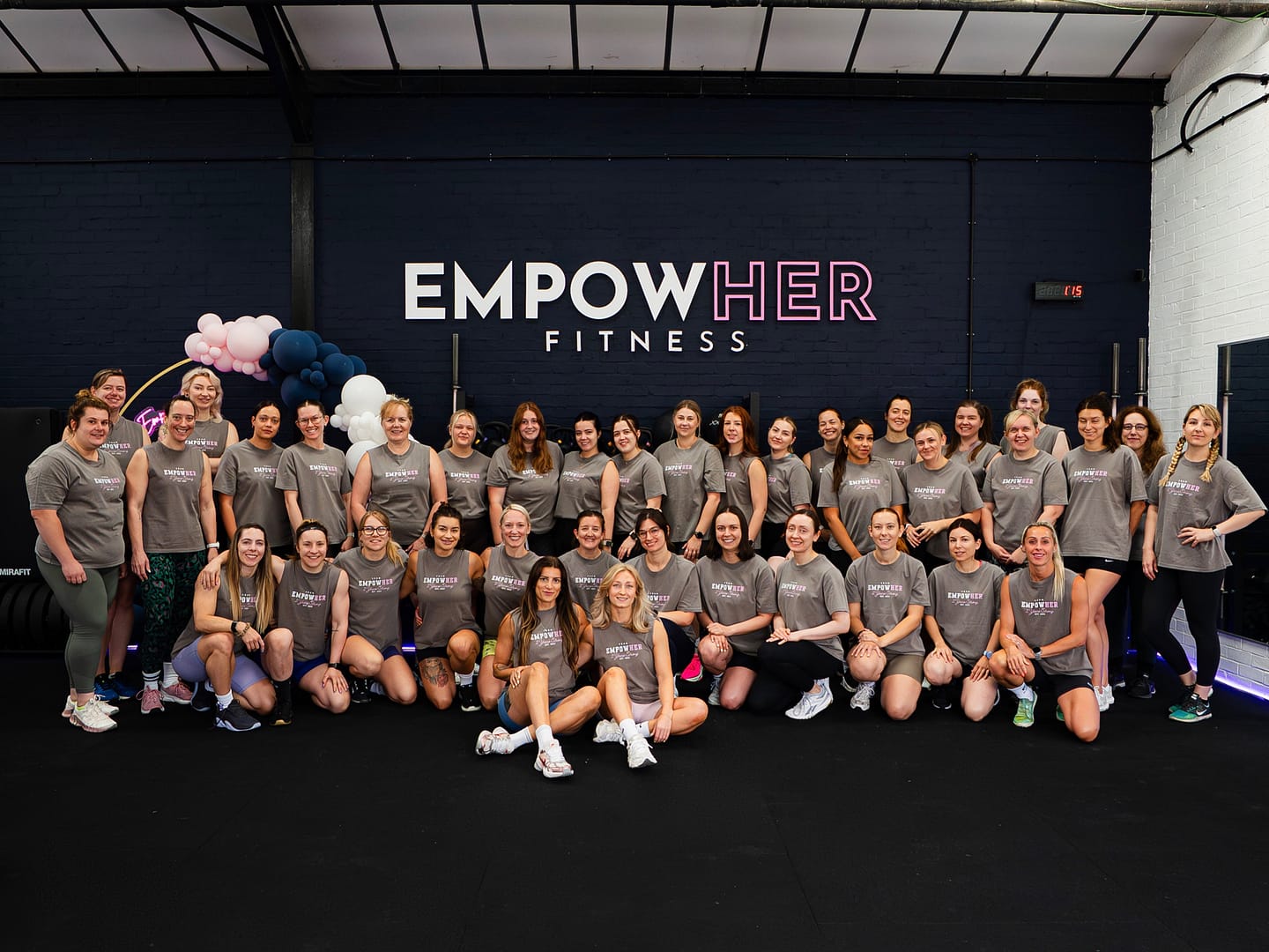 Women’s fitness group at EmpowerHer gym event