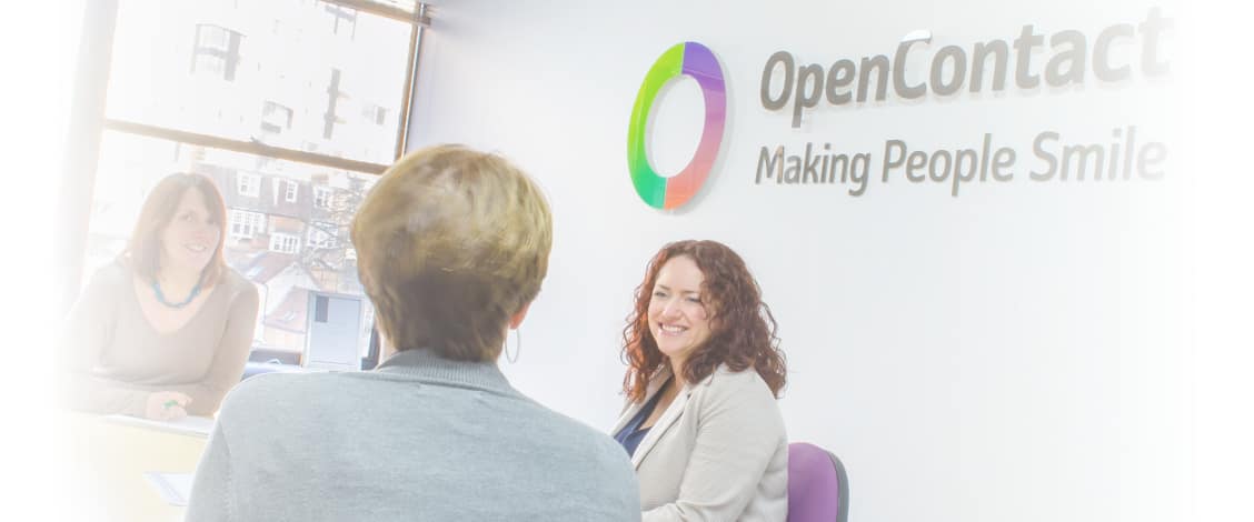 People talking at OpenContact office meeting