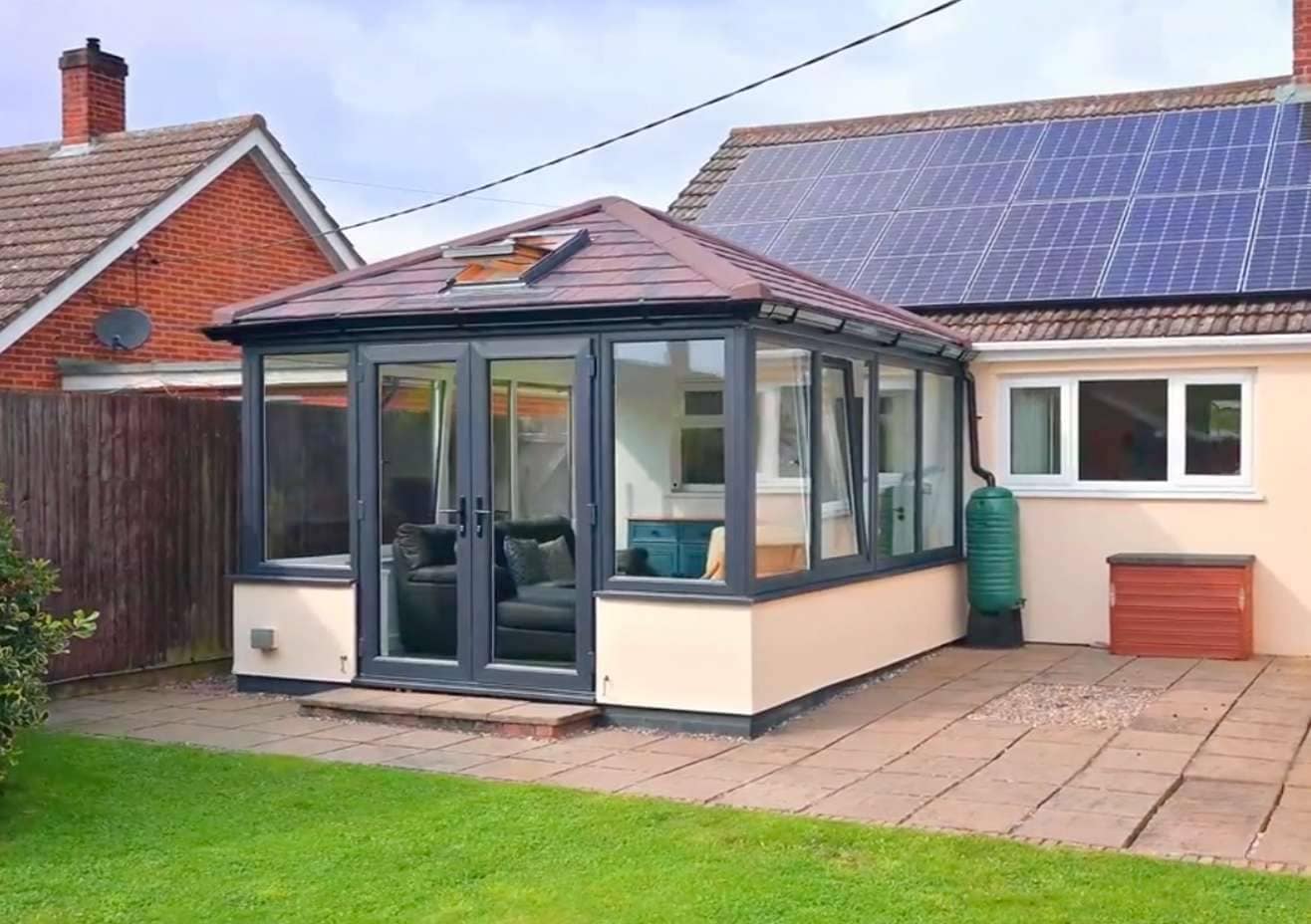 Conservatory upgrade burnt umber tiles