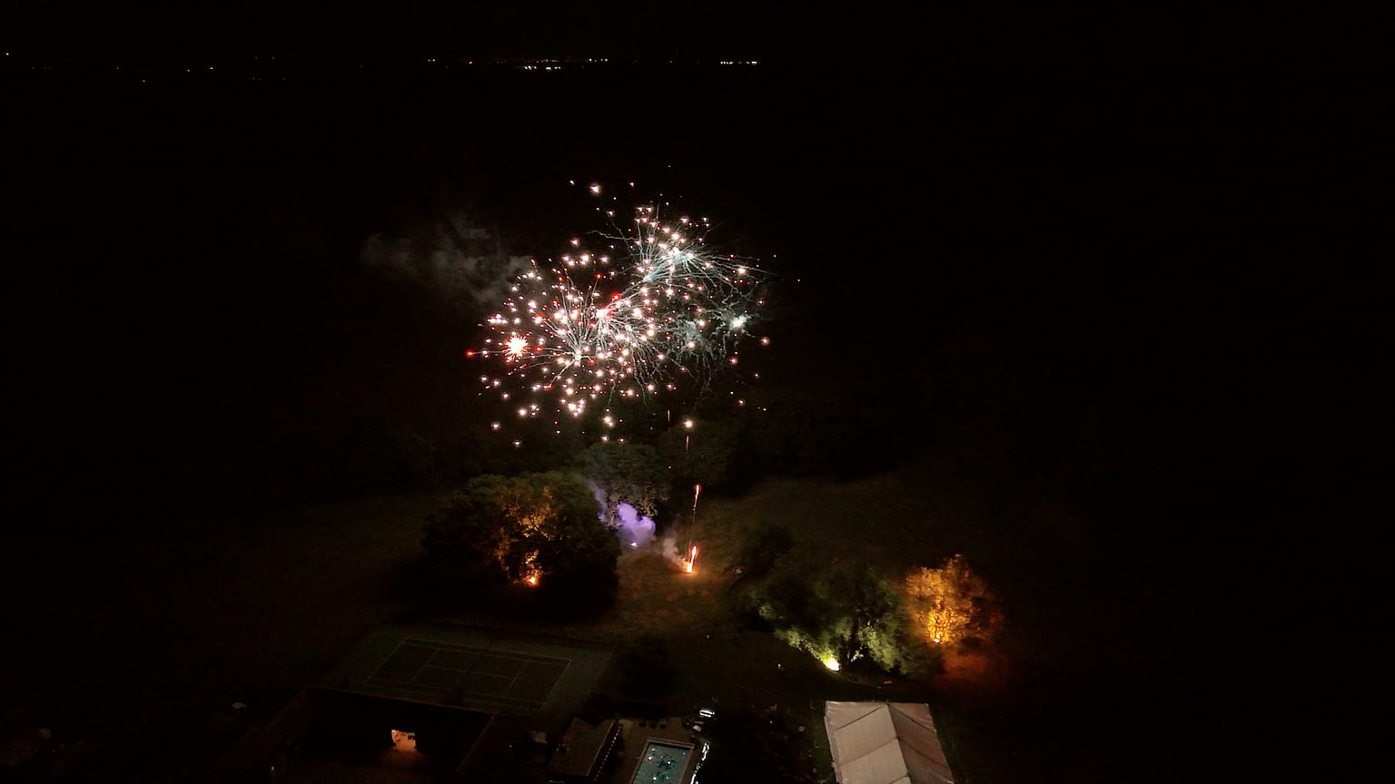 Aerial view of fireworks display at night.