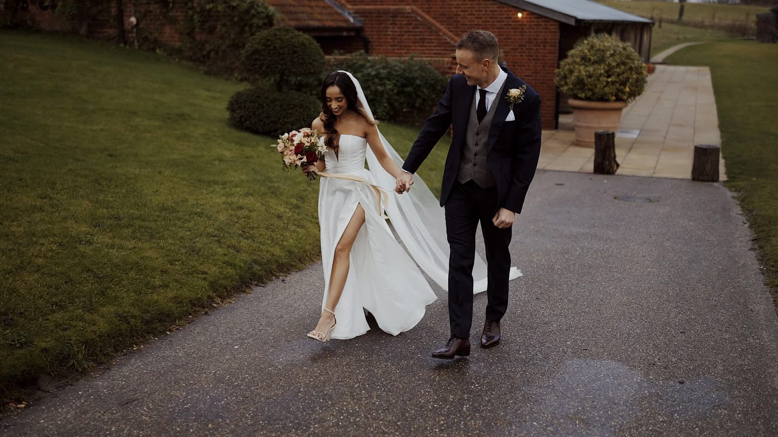 Bride and groom walking on wedding day