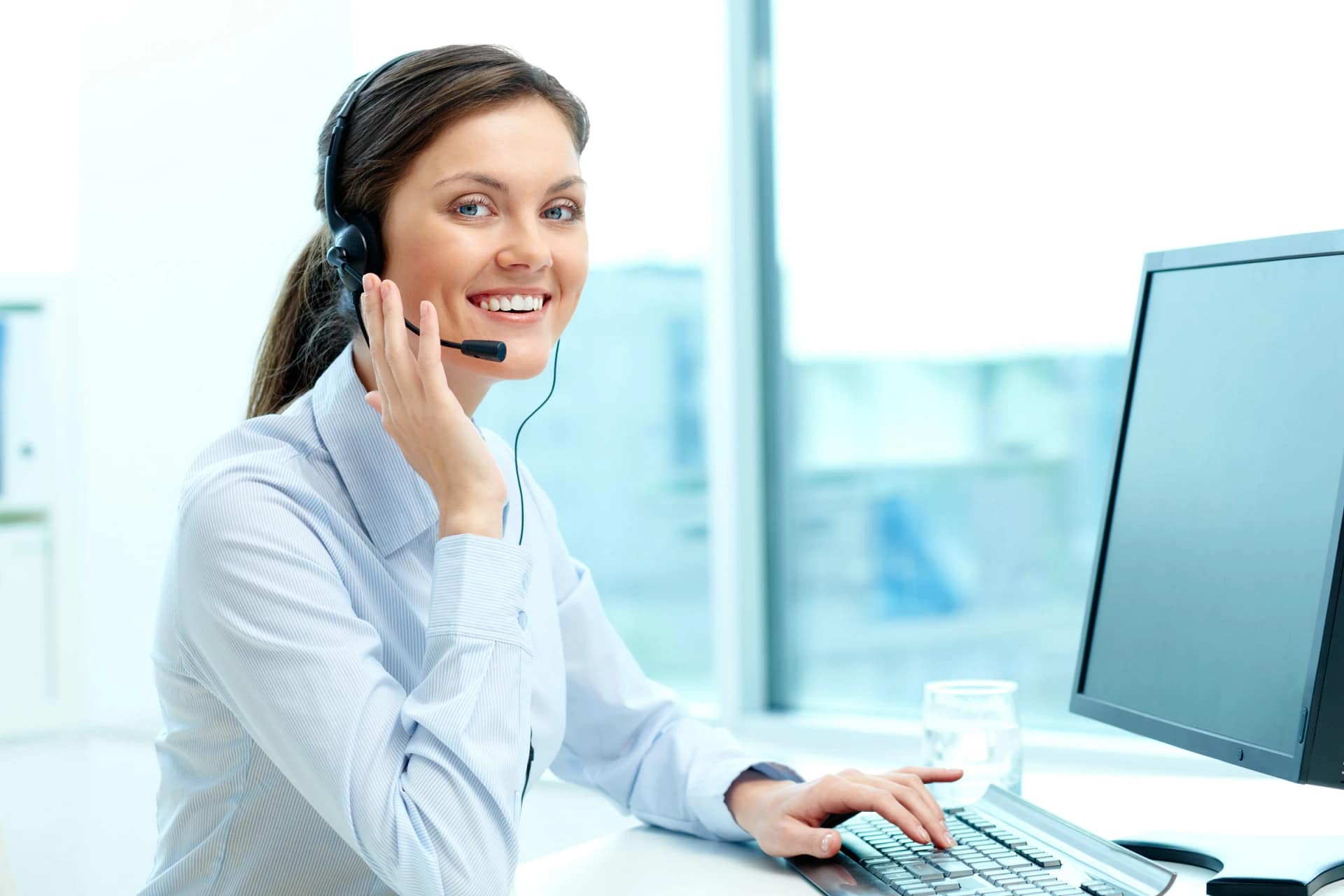 Smiling customer service representative on headset
