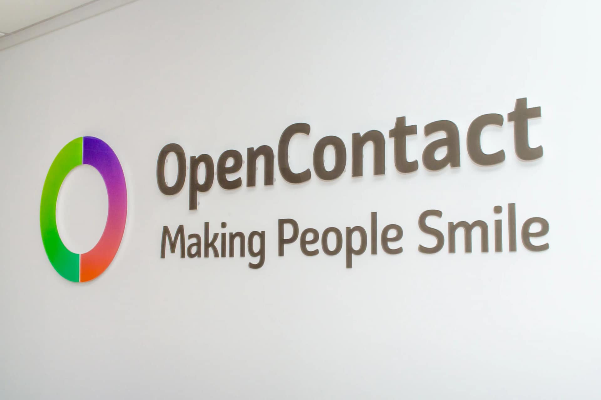 OpenContact logo with slogan Making People Smile