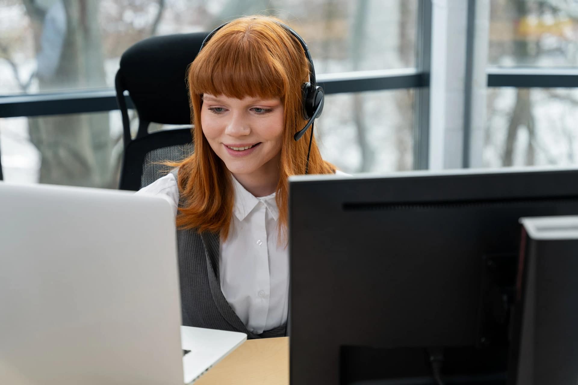 Customer service agent working on computer