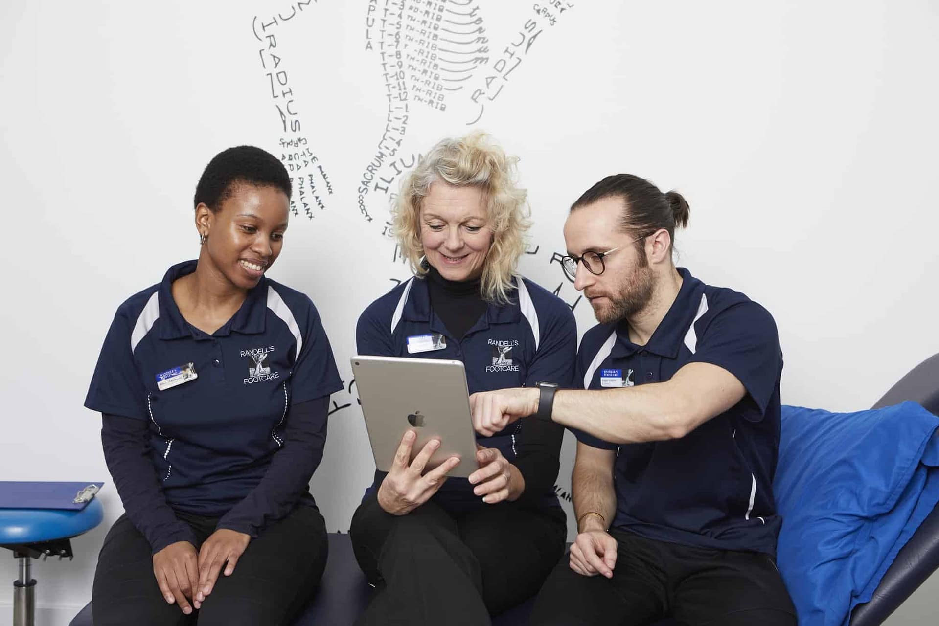 3 podiatrist chatting together