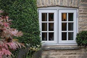 White timber core heritage window