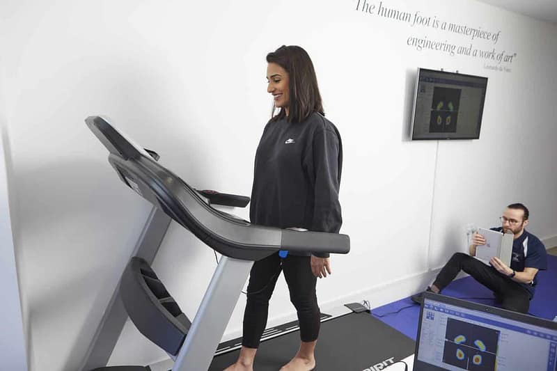 podiatrist with patient on treadmill