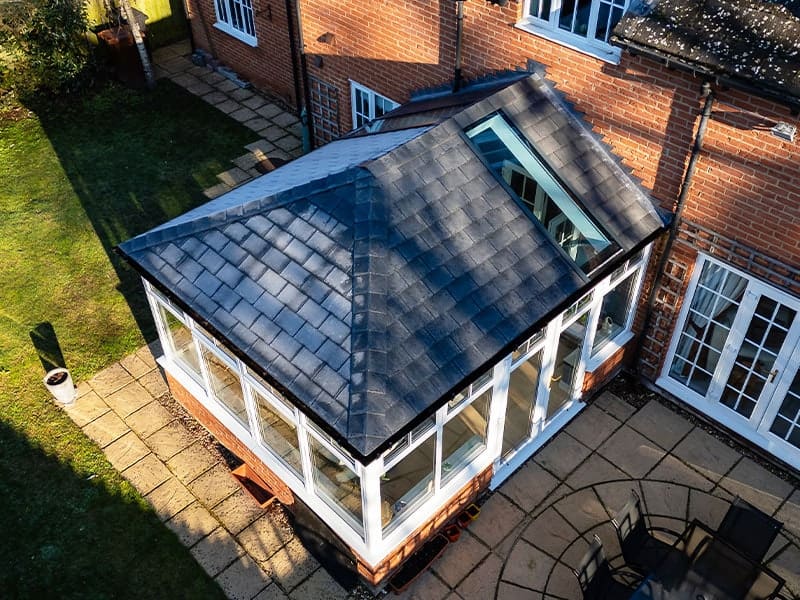 Tiled roof replacement with glass panels