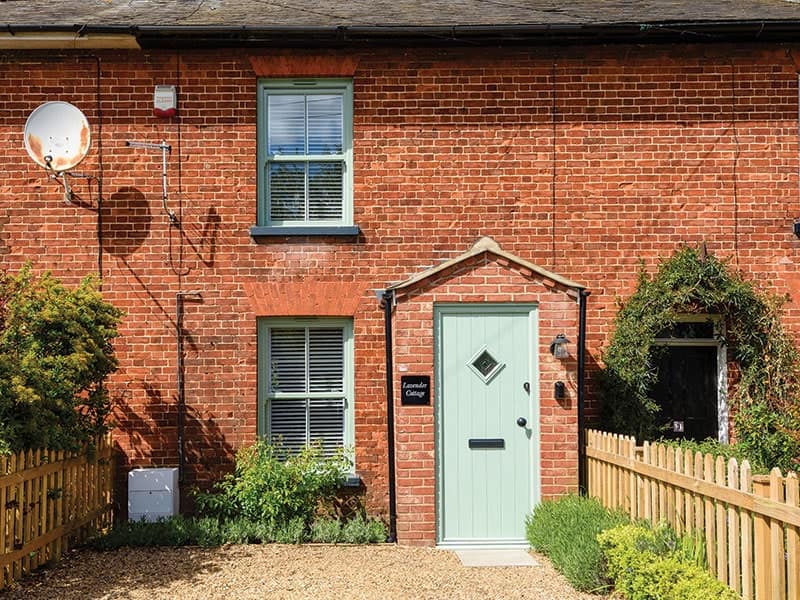 Vertical sash window in chartwell green